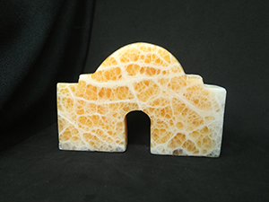 The Alamo textured brown and white exterior, reflecting the cellular structure of the Honeycomb Calcite.